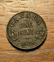 Reverse showing CANADA ONE CENT 1928 and maple leaves