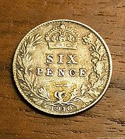 Reverse side showing denomination, wreath, crown, date