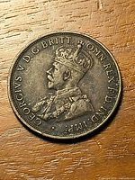 Obverse showing crowned portrait of King George V and full legend