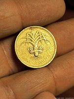 Reverse showing crowned leek design and ONE POUND legend