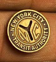 Obverse side showing NEW YORK CITY TRANSIT AUTHORITY text and Y-cut center