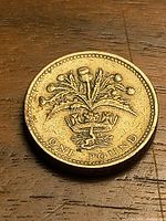 Reverse showing crowned thistle design and ONE POUND legend