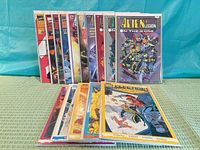 Front and top view showing entire spread of bagged comics