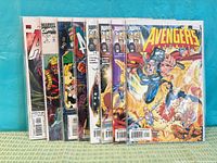 Group shot of all nine bagged Avengers comics