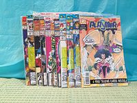 Front view of entire stack of sealed comics showing polybagged X-Cutioner’s Song issues and Plasmer #1