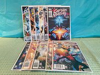 Front covers of all Captain Marvel issues displayed upright and flat