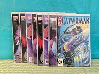 Eight bagged comics including Catwoman #1 and seven Kingpin issues