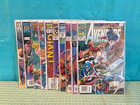 Group shot of all ten bagged Avengers comics, spines flush showing cover art and issue numbers