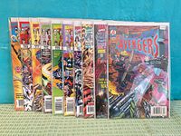 Front view showing all ten bagged Avengers comics side by side