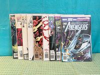 Front view showing all nine bagged Avengers comics standing upright