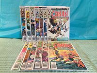 Lot overview showing all 13 bagged Conan comics