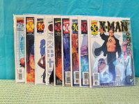 Front view of all nine X-Man issues bagged and boarded