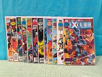 Front view of all twelve bagged Excalibur comics issues 100-111