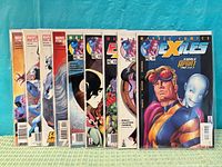 Front covers of nine Exiles issues lined up