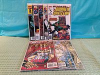 All nine comics displayed, bagged and boarded