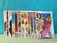 Group shot of 12 bagged X-Men comics standing upright