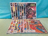 Front and back rows of bagged Marvel Hulk and Fantastic Four comics