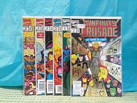 Front view showing all six bagged comics side by side