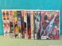 Front view of all eleven bagged comics standing side by side