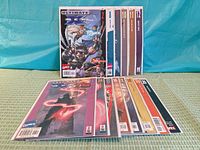 All fourteen Ultimate X-Men comics spread out, showing front covers and issue numbers