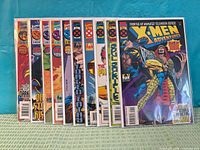 Front view showing all ten bagged comics in sequence