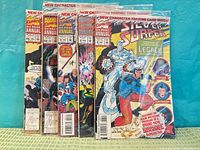 Front view of five sealed Marvel annual comics