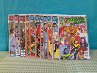 All eleven comics fanned out showing covers and issue numbers
