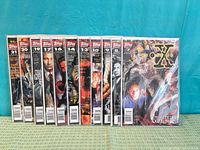 Front view of all eleven bagged comics aligned side by side