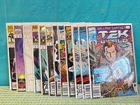 Front view of all eleven bagged TekWorld comics standing side-by-side