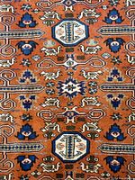 Close-up of central field pattern with octagonal medallion and sword motifs