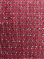 Close-up of rug field displaying repeating guls