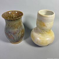 Both pottery vases side by side
