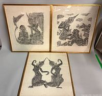 All three framed Thai rubbed prints together