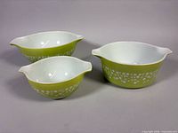 All three graduated Spring Blossom Green Pyrex bowls side by side