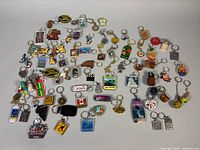 Full layout showing more than 40 assorted keychains