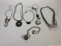 All six jewelry pieces laid out