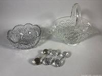 Group view of basket, bowl and three knife rests