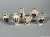 All six miniature souvenir china pieces front view