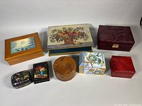 All eight boxes grouped for scale and variety