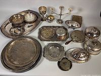 Group shot of all silver plate items displayed