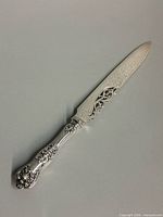 Full view of sterling cake cutter