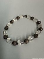 Full view of entire necklace showing bead arrangement and clasp