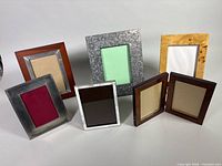 Group shot of all six frames showing variety of materials and sizes