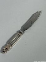 Full view of cutter knife showing blade and handle