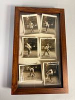 Front view of closed shadow box displaying six photos