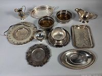 Group shot of all silver-plated items in lot