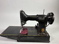 Full view left side Singer Featherweight 221K on extension bed