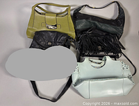 Group shot of five handbags