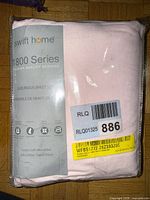 Front of packaged Swift Home sheet set showing brand, series, color and barcode