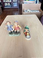 front view of both figurines